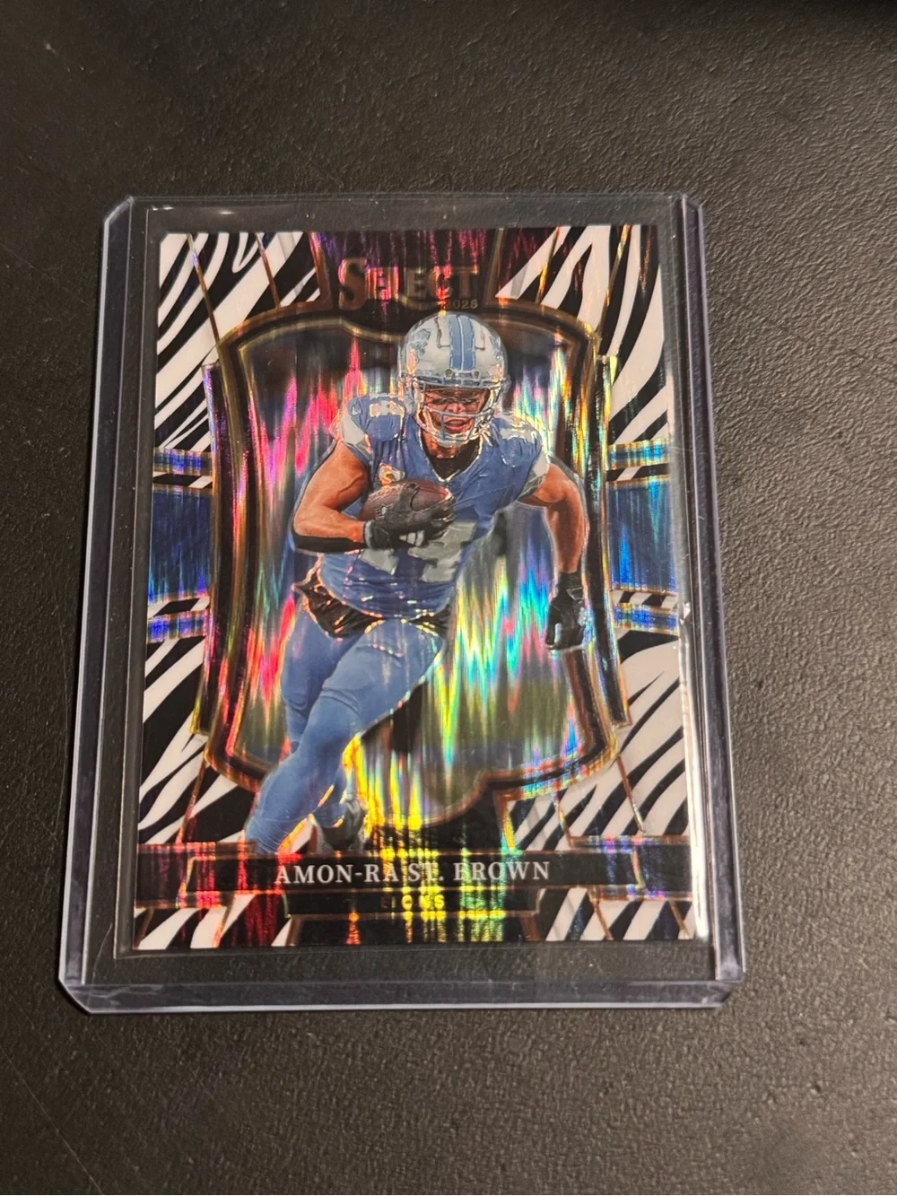 Panini 2025 Select Football Amon-Ra St. Brown #170 Premier Level Zebra Prizm SSP